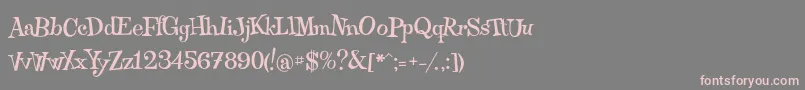 フォントQraxy – 灰色の背景にピンクのフォント