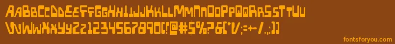 フォントXpedcond – オレンジ色の文字が茶色の背景にあります。