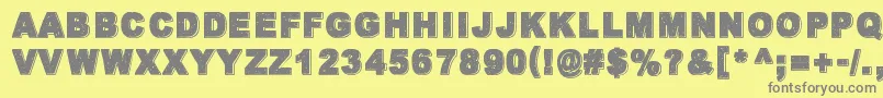 WalkWithMeNow-fontti – harmaat kirjasimet keltaisella taustalla