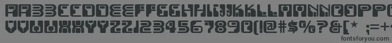 Funkyrundkopfnf-Schriftart – Schwarze Schriften auf grauem Hintergrund