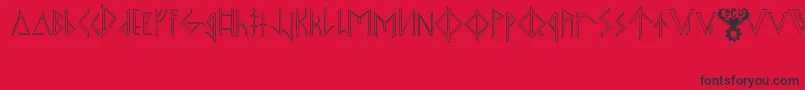 OdinsSpearRaggedHollow-Schriftart – Schwarze Schriften auf rotem Hintergrund