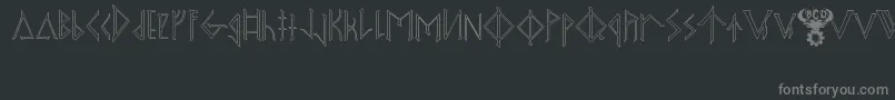 OdinsSpearRaggedHollow-fontti – harmaat kirjasimet mustalla taustalla