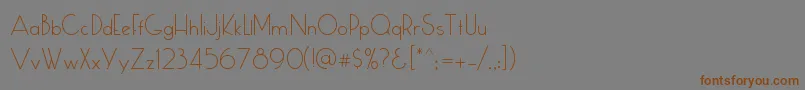 フォントCumulus – 茶色の文字が灰色の背景にあります。