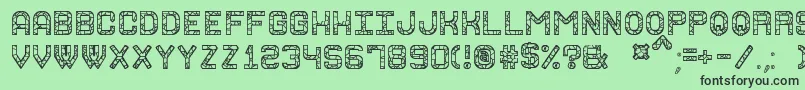 フォントGraniteRockSt – 緑の背景に黒い文字