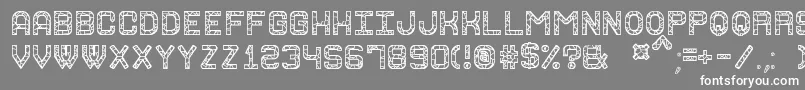 Шрифт GraniteRockSt – белые шрифты на сером фоне