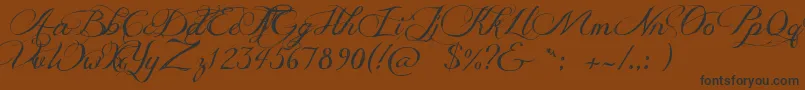 JellykaDeliciousCake Font – Black Fonts on Brown Background