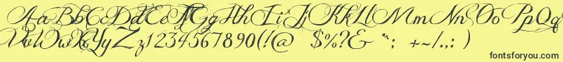 JellykaDeliciousCake Font – Black Fonts on Yellow Background