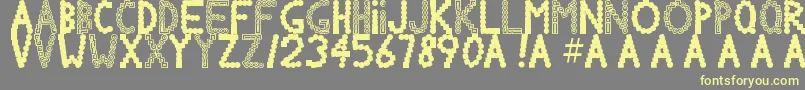 Chlorinov Font – Yellow Fonts on Gray Background
