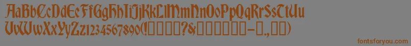 More about RomvelCyr Font RomvelCyr Font – Brown Fonts on Gray Background