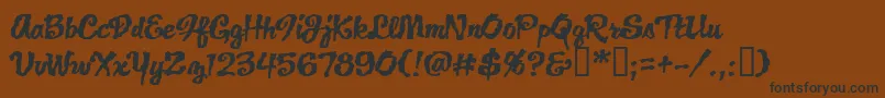 フォントJacklanternBb – 黒い文字が茶色の背景にあります