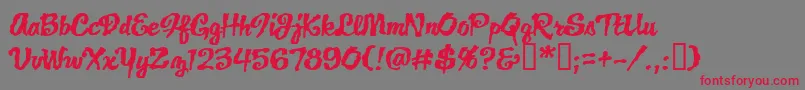 フォントJacklanternBb – 赤い文字の灰色の背景