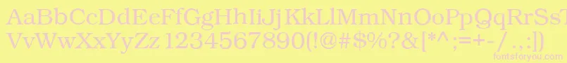Czcionka Kacstbook – różowe czcionki na żółtym tle