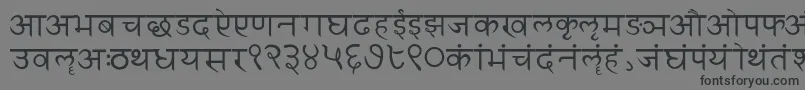 Sanskritwriting-fontti – mustat fontit harmaalla taustalla