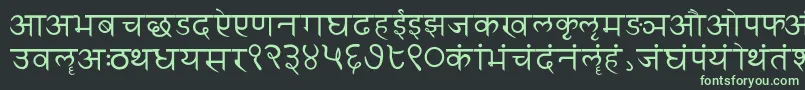 Sanskritwriting-fontti – vihreät fontit mustalla taustalla