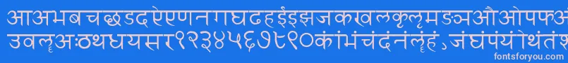 Czcionka Sanskritwriting – różowe czcionki na niebieskim tle