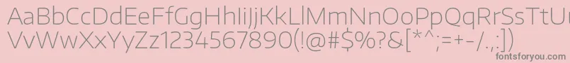 フォントEncodesanswideThin – ピンクの背景に灰色の文字