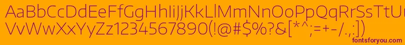 Czcionka EncodesanswideThin – fioletowe czcionki na pomarańczowym tle