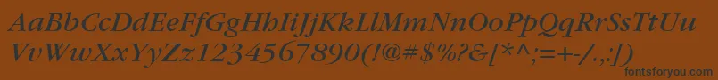 Fonte ItcGaramondLtBookItalic – fontes pretas em um fundo marrom