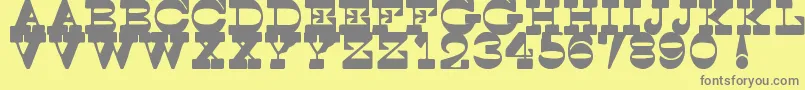 SpoghettiWesternTfb-Schriftart – Graue Schriften auf gelbem Hintergrund