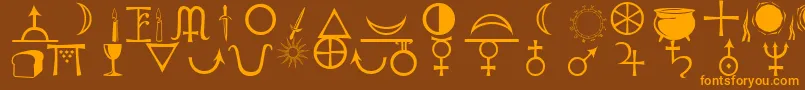 Astrological-fontti – oranssit fontit ruskealla taustalla