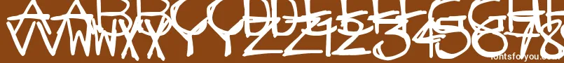 フォントMadStickBrush – 茶色の背景に白い文字