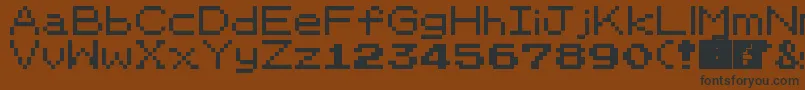 PkmnRbygsc Font – Black Fonts on Brown Background