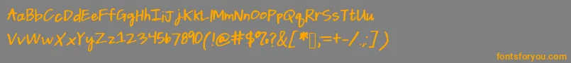 Daintydaisies Font – Orange Fonts on Gray Background