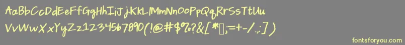 Daintydaisies Font – Yellow Fonts on Gray Background