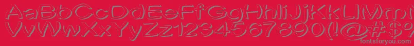 Uni Tortred Font – Gray Fonts on Red Background