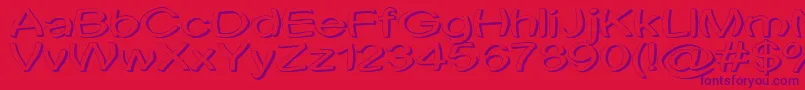 Uni Tortred Font – Purple Fonts on Red Background