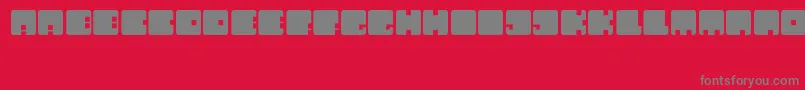 フォントAndyCubes – 赤い背景に灰色の文字