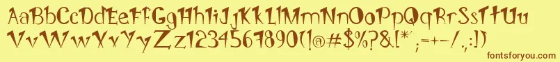 フォントPongo – 茶色の文字が黄色の背景にあります。