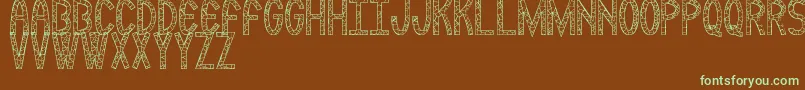 Rockmia Font – Green Fonts on Brown Background