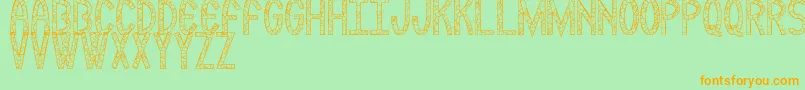 Rockmia Font – Orange Fonts on Green Background