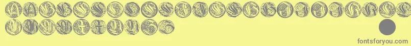 Fonte Wieynkcapsround – fontes cinzas em um fundo amarelo
