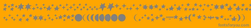 Fonte Astronomy – fontes cinzas em um fundo laranja