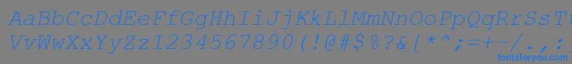 Czcionka CourtiercItalic – niebieskie czcionki na szarym tle
