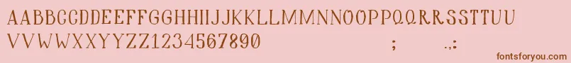 Hiddencinema Font – Brown Fonts on Pink Background