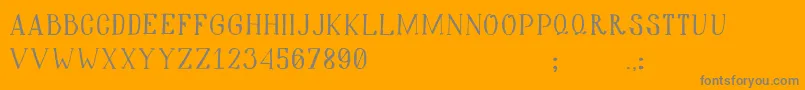 Hiddencinema Font – Gray Fonts on Orange Background