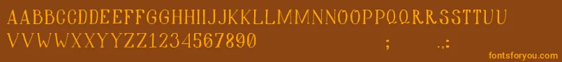 Hiddencinema Font – Orange Fonts on Brown Background