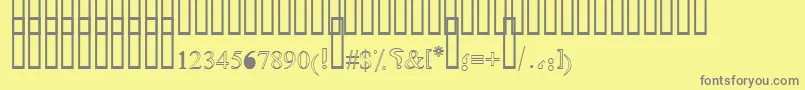 Fonte OldAnticOutlineShaded – fontes cinzas em um fundo amarelo