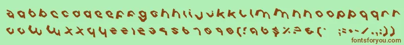 CharliesAnglesRotate-Schriftart – Braune Schriften auf grünem Hintergrund