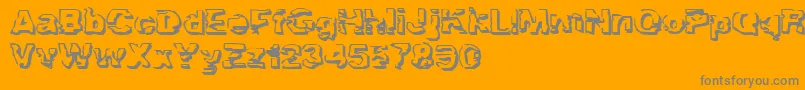 フォントTroglodyteTroglodyte – オレンジの背景に灰色の文字