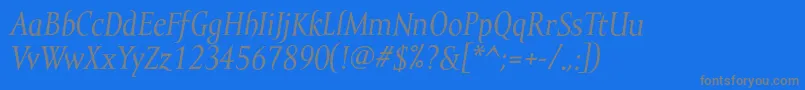 MramortextItalic-fontti – harmaat kirjasimet sinisellä taustalla