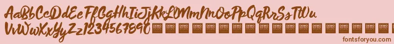 Fonte WildThingDemo – fontes marrons em um fundo rosa