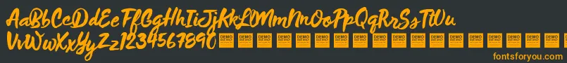 フォントWildThingDemo – 黒い背景にオレンジの文字