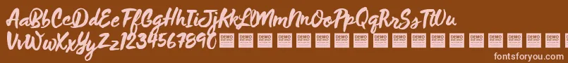 フォントWildThingDemo – 茶色の背景にピンクのフォント