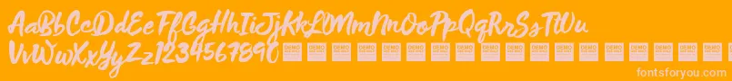 WildThingDemo-Schriftart – Rosa Schriften auf orangefarbenem Hintergrund
