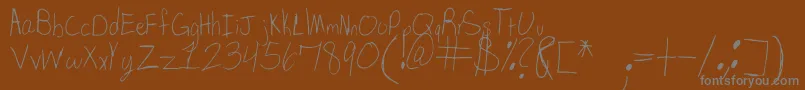 SpDearMom Font – Gray Fonts on Brown Background