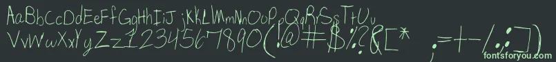 SpDearMom Font – Green Fonts on Black Background